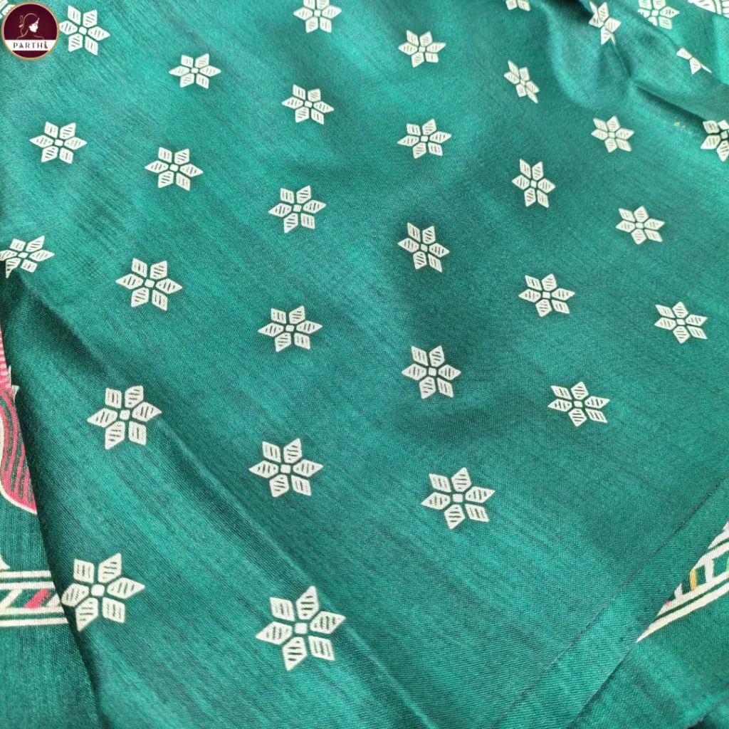 replica-silk-green-saree-tribal-motif.webp